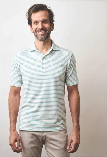 Model wearing the Island Cotton polo in Medium